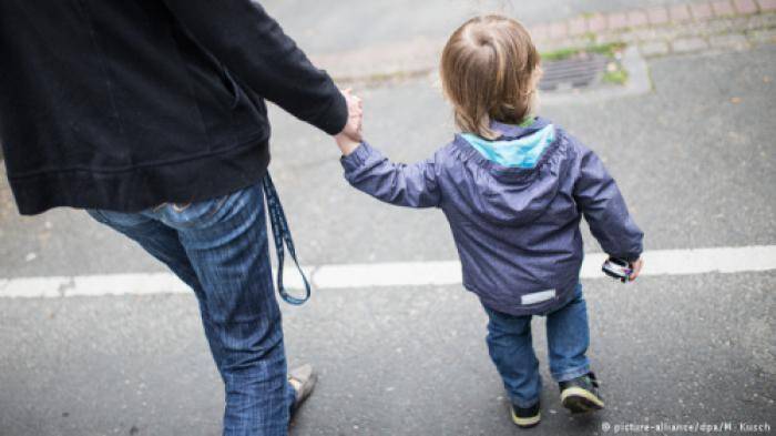 Holding Child's hand